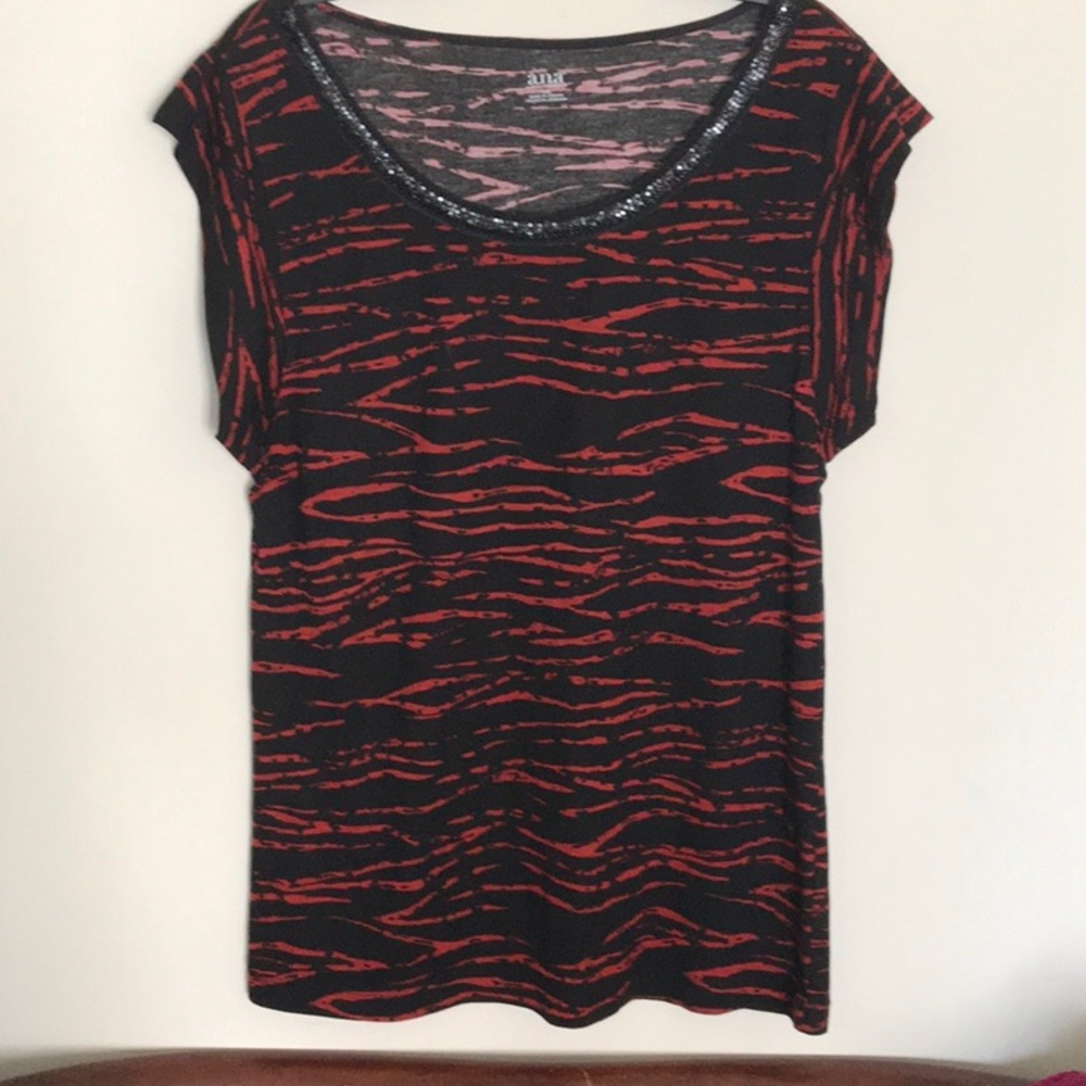 Small sequins round the neck, and zebra print!